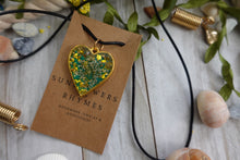 Load image into Gallery viewer, Handmade Green and Gold Pendent Charm made from Resin and Real Pressed Flower
