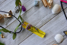 Load image into Gallery viewer, Yellow and Purple Pressed Flower Necklace
