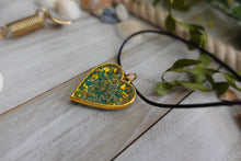 Load image into Gallery viewer, Handmade Green and Gold Pendent Charm made from Resin and Real Pressed Flower
