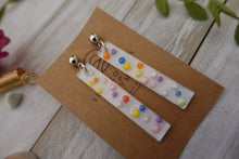 Load image into Gallery viewer, White polka dot rainbow earrings
