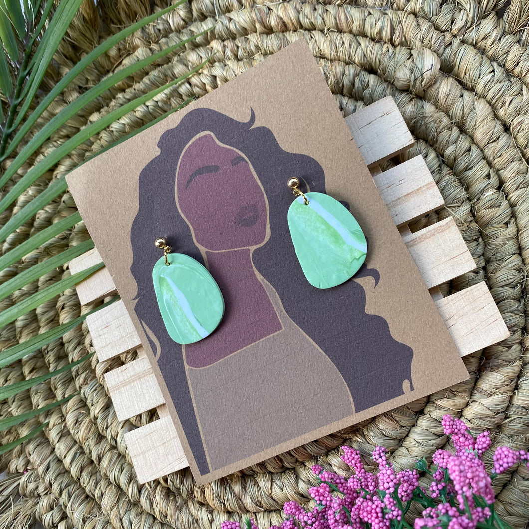 Light green and white dangle earrings