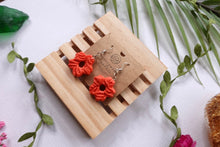 Load image into Gallery viewer, Small orange peach  flower textured polymer clay earrings
