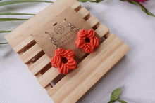Load image into Gallery viewer, Small orange peach  flower textured polymer clay earrings
