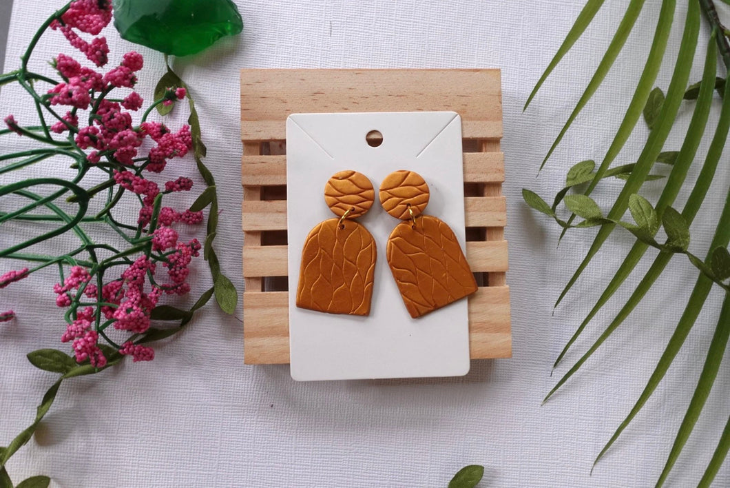 Handmade Gold textured print arch earrings