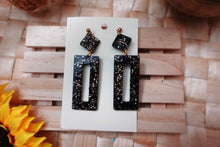 Load image into Gallery viewer, Handmade | Black and gold resin beaded dangle earrings
