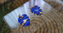 Load image into Gallery viewer, Small Blue and Gold Monstera dangle earrings | polymer clay earrings | handmade
