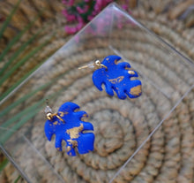 Load image into Gallery viewer, Small Blue and Gold Monstera dangle earrings | polymer clay earrings | handmade
