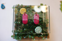 Load image into Gallery viewer, Small pink pill shaped polymer clay earrings
