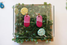 Load image into Gallery viewer, Small pink pill shaped polymer clay earrings
