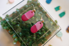 Load image into Gallery viewer, Small pink pill shaped polymer clay earrings
