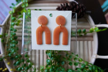 Load image into Gallery viewer, Light Brown polymer clay earrings | arch dangle | clear brown |
