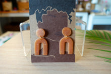 Load image into Gallery viewer, Light Brown polymer clay earrings | arch dangle | clear brown |
